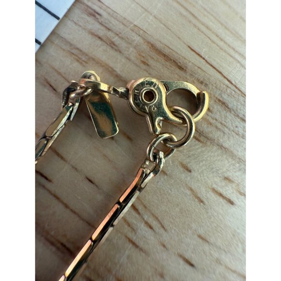 Monet Gold-Tone Twisted Knot Pendant Necklace With 16" Chain - Picture 5 of 7